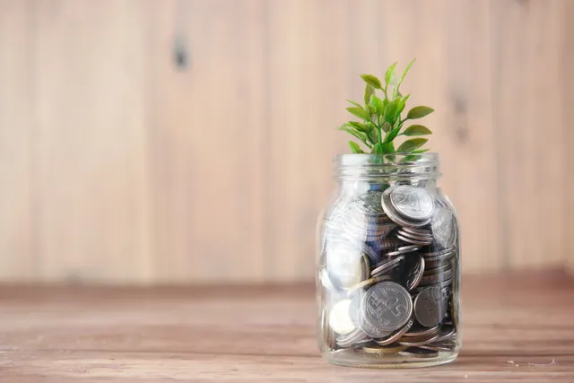 Picture of a jar with coins in it